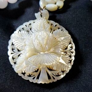 Rare Carved Flower Necklace